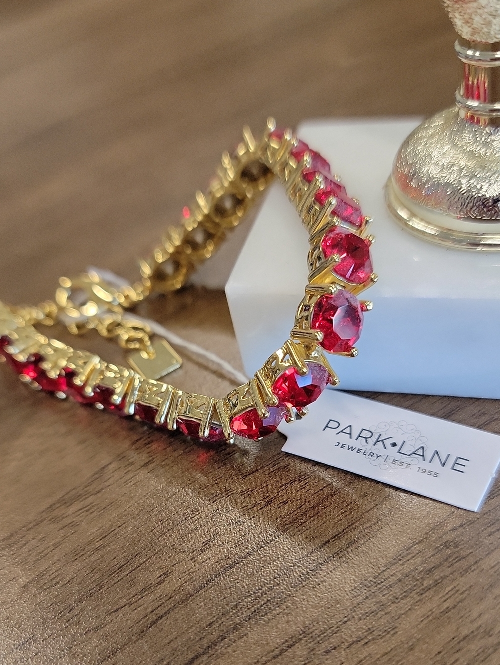 Park Lane Impression Bracelet with Vivid Red Crystals On Gold Bracelet
